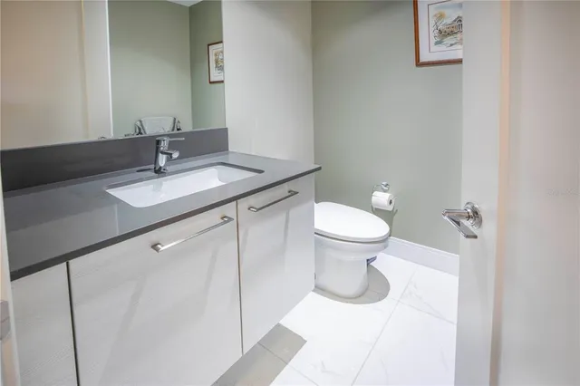 a view of a room with white doors