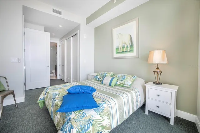 a bathroom with a shower sink and mirror