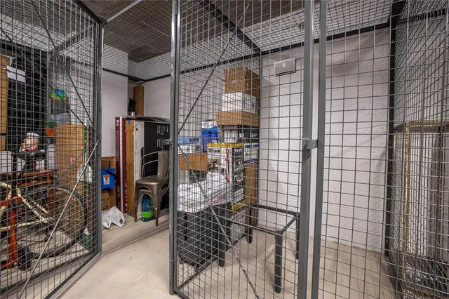 a white bench sitting in front of a building