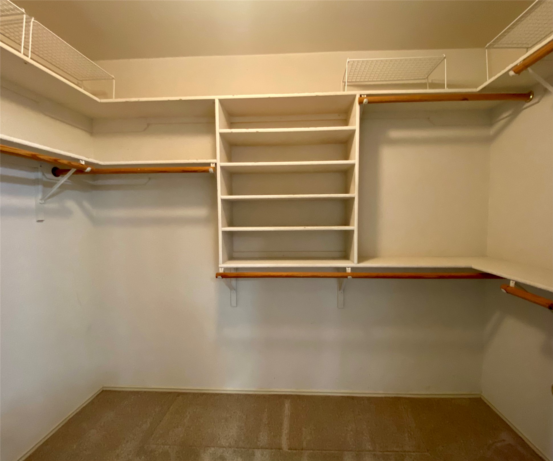 4615 Tello Path Austin, TX 78749 - Photo 19 of 29 A well-organized walk-in closet offers ample storage with integrated shelving and hanging rods.