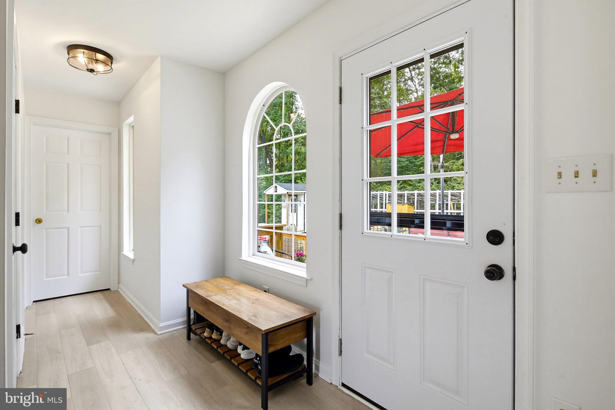 Welcoming entry with brand new front door!