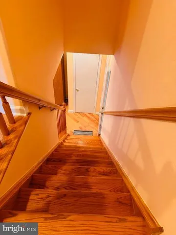 a view of balcony with wooden floor
