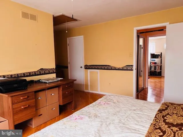 a workspace room with furniture