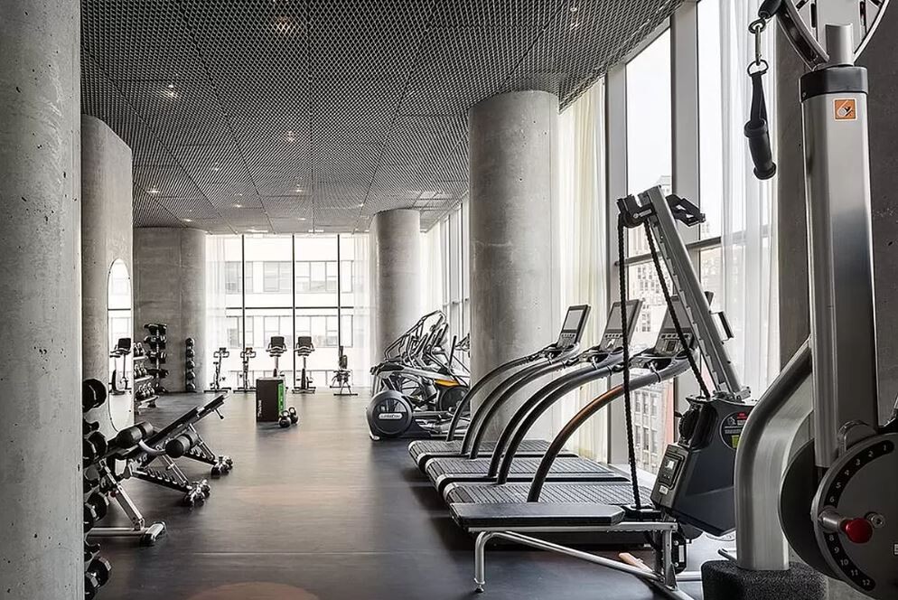 56 Leonard Street, Unit 43BEAST Manhattan, NY 10013 - Photo 13 of 16 a view of a room with gym equipment