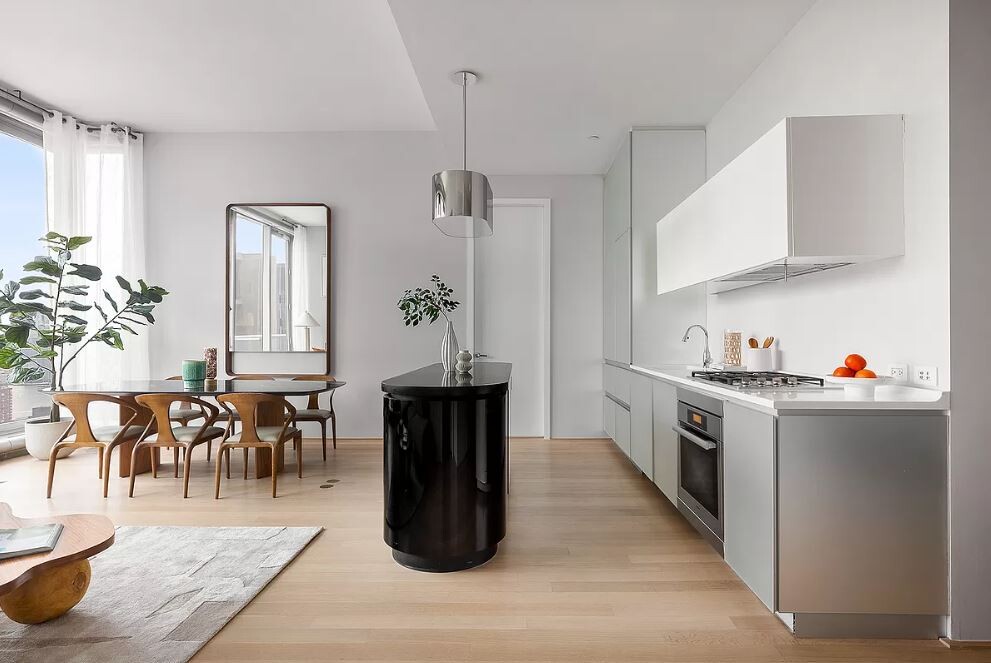 56 Leonard Street, Unit 43BEAST Manhattan, NY 10013 - Photo 4 of 16 a kitchen with stove and cabinets