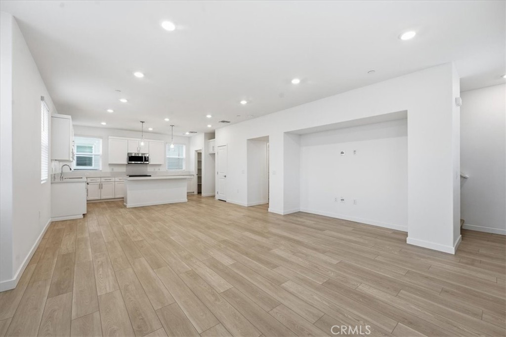 9335 Via Azul Pico Rivera, CA 90660 - Photo 25 of 55 a view of kitchen with wooden floor
