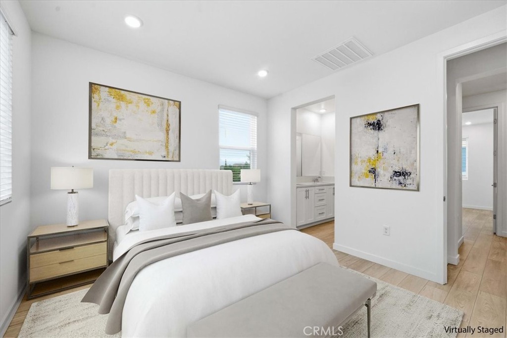 9335 Via Azul Pico Rivera, CA 90660 - Photo 33 of 55 a bedroom with a bed and a painting on the wall