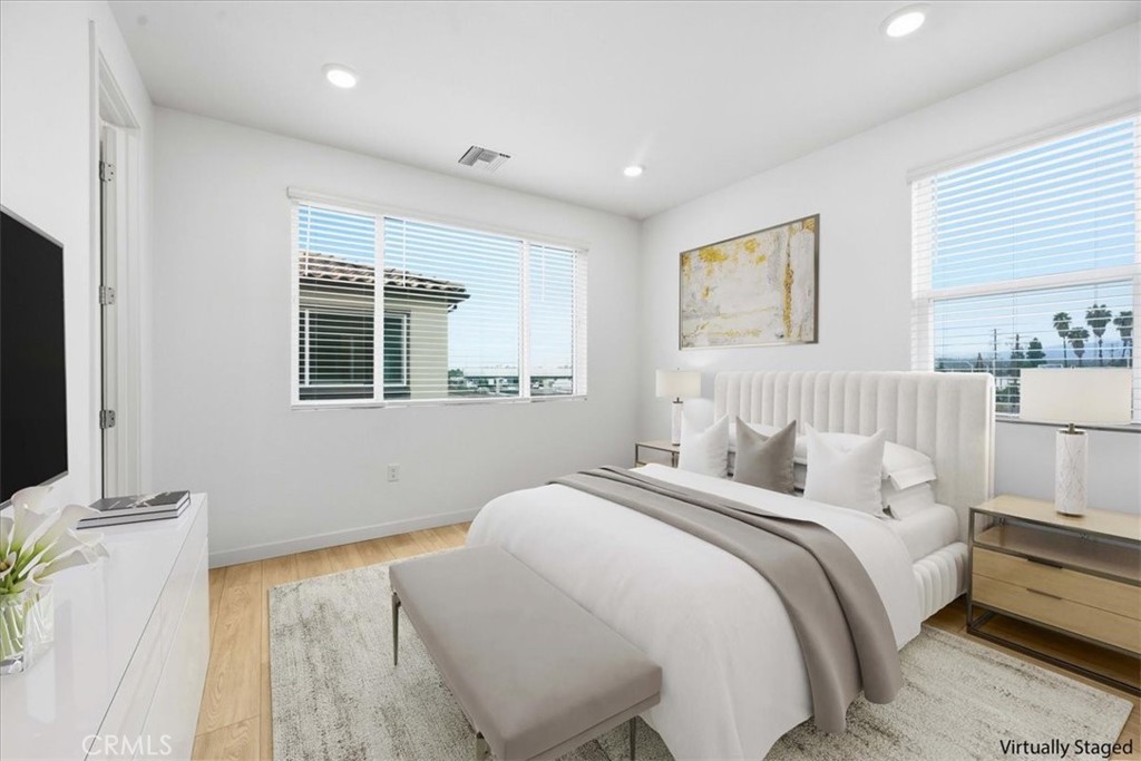 9335 Via Azul Pico Rivera, CA 90660 - Photo 35 of 55 a bedroom with bed and a flat tv screen