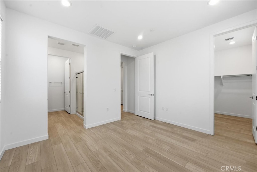 9335 Via Azul Pico Rivera, CA 90660 - Photo 36 of 55 a view of hallway with wooden floor