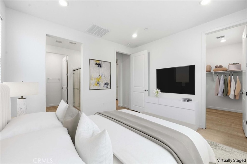 9335 Via Azul Pico Rivera, CA 90660 - Photo 37 of 55 a bedroom with a bed and a flat screen tv