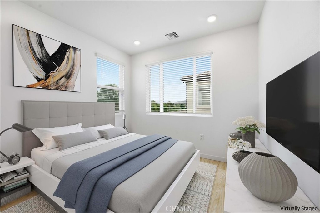 9335 Via Azul Pico Rivera, CA 90660 - Photo 43 of 55 a bedroom with bed couch and window