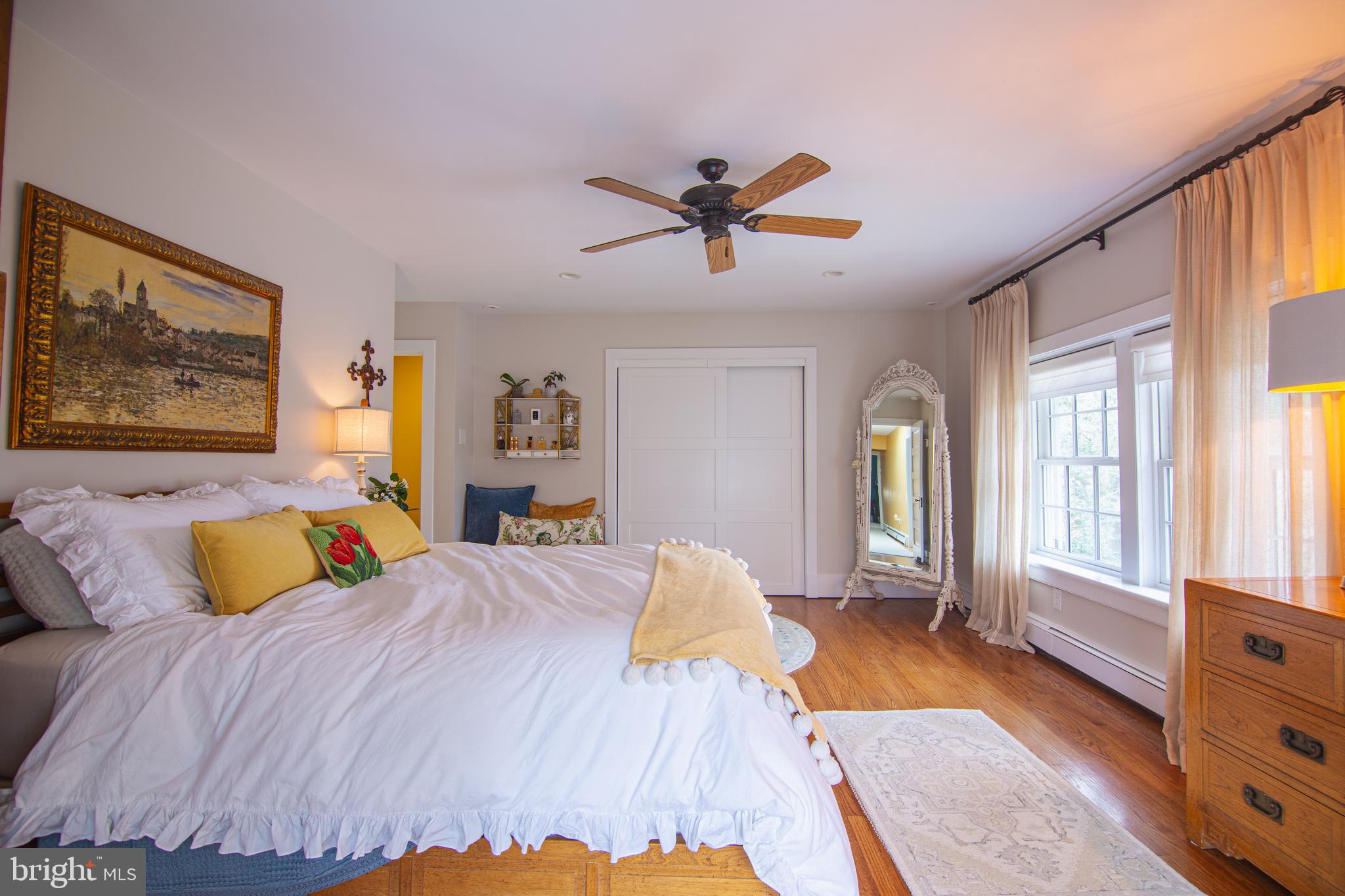 613 South Valley Forge Road Wayne, PA 19087 - Photo 17 of 43 a bedroom with a bed a dresser and next to a window