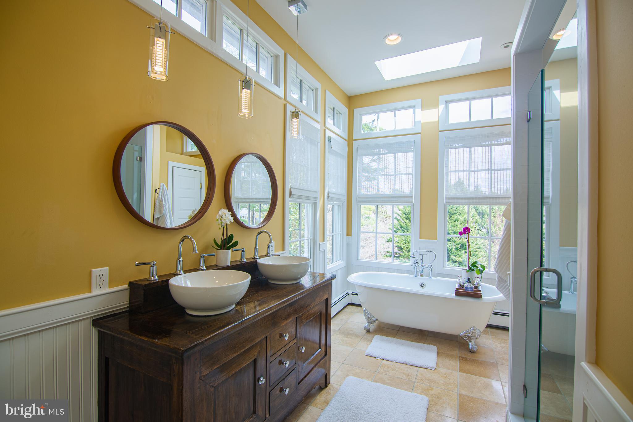 613 South Valley Forge Road Wayne, PA 19087 - Photo 18 of 43 a bathroom with a sink and a mirror