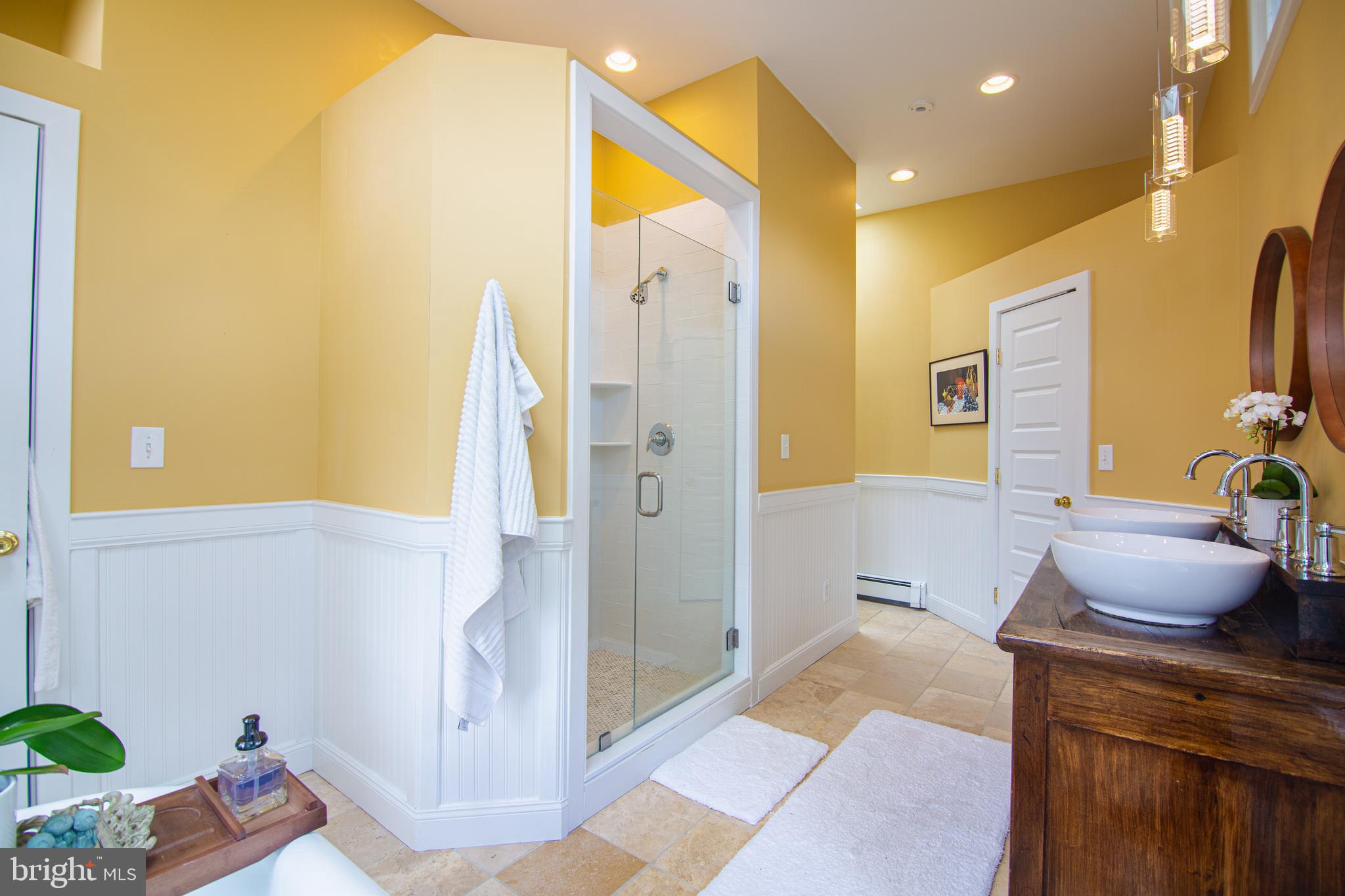 613 South Valley Forge Road Wayne, PA 19087 - Photo 19 of 43 a bathroom with a granite countertop sink a mirror and shower