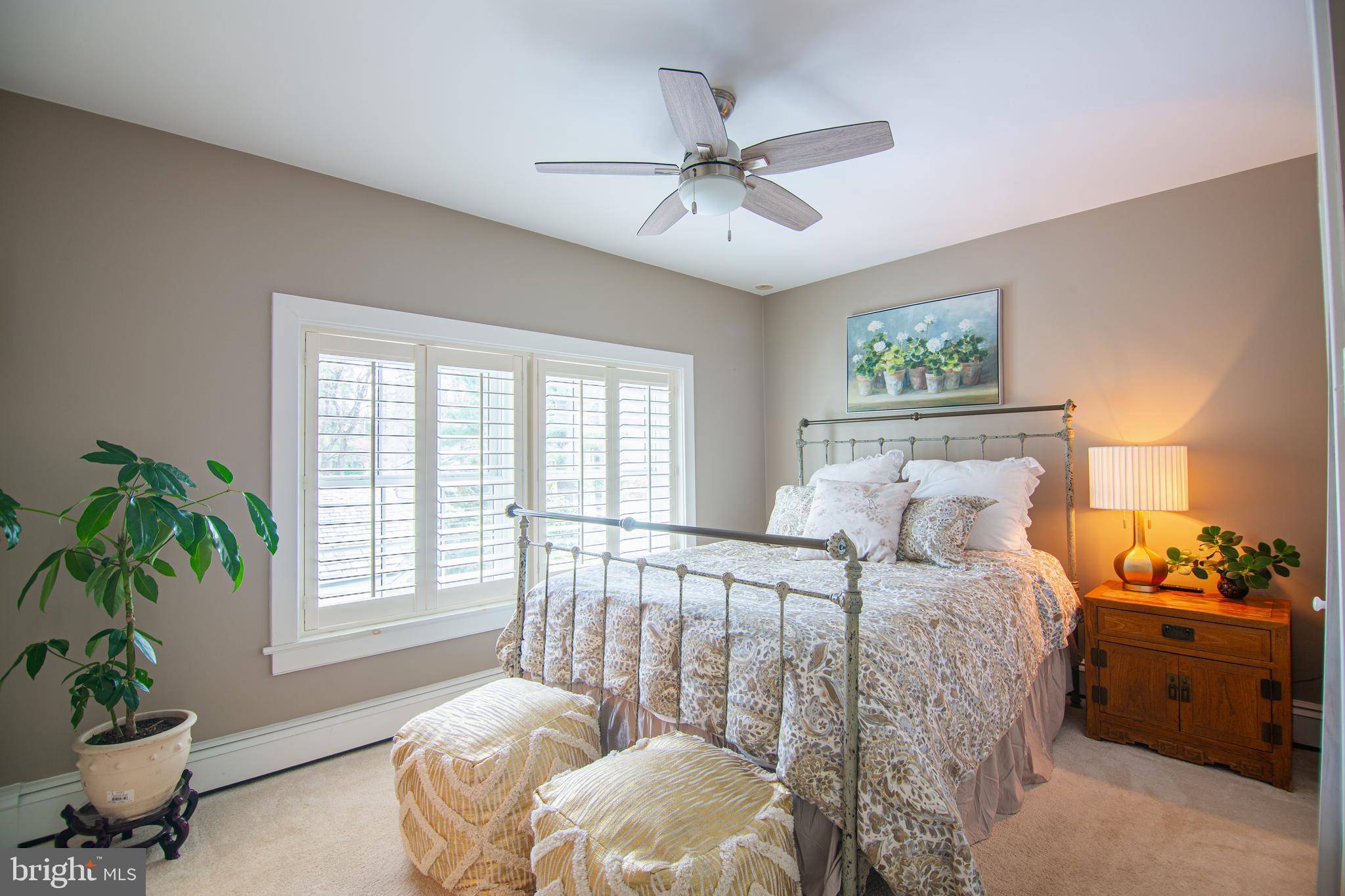 613 South Valley Forge Road Wayne, PA 19087 - Photo 20 of 43 a bedroom with a bed and ceiling fan