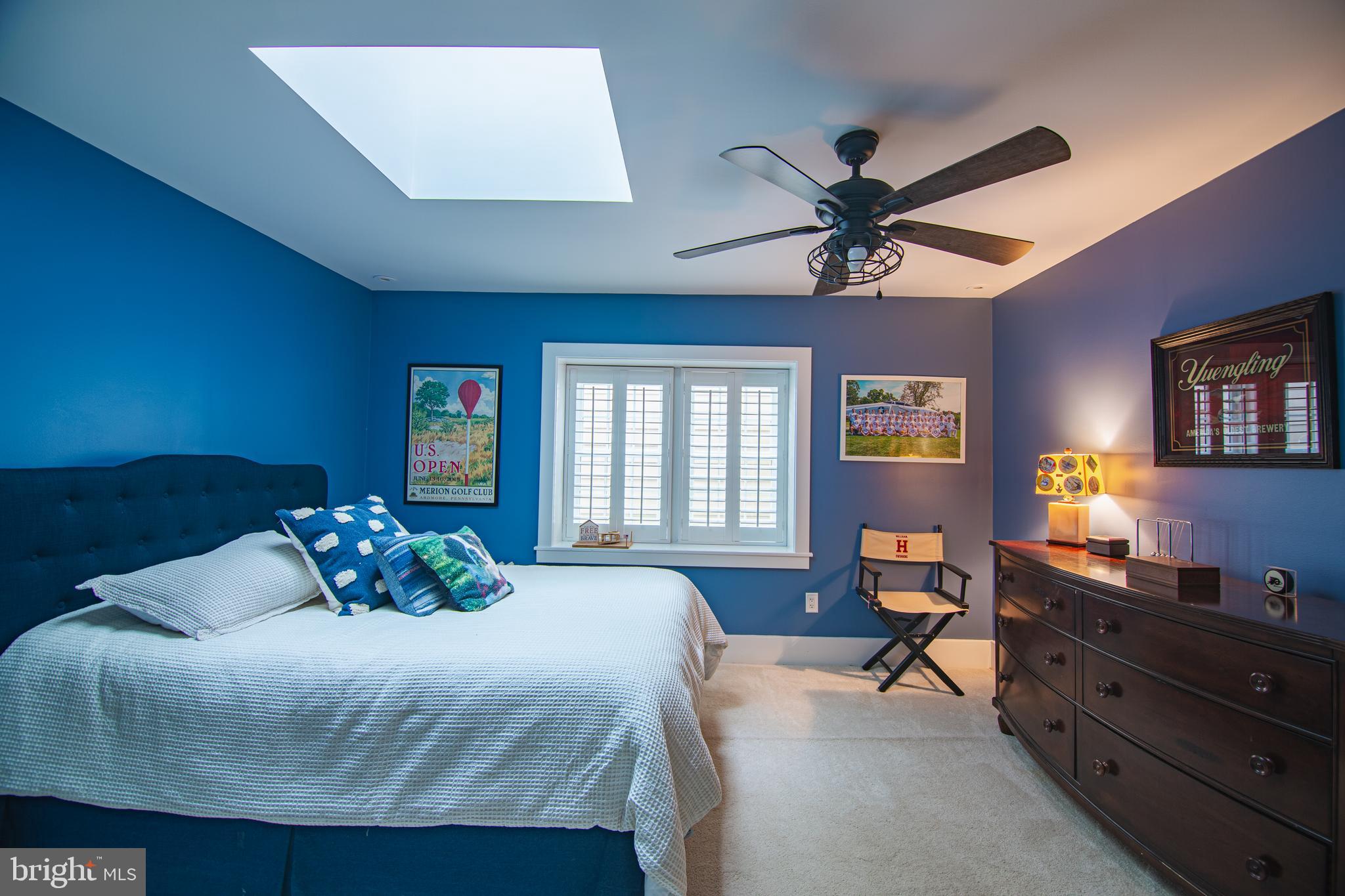 613 South Valley Forge Road Wayne, PA 19087 - Photo 22 of 43 a bedroom with a bed and wooden floor
