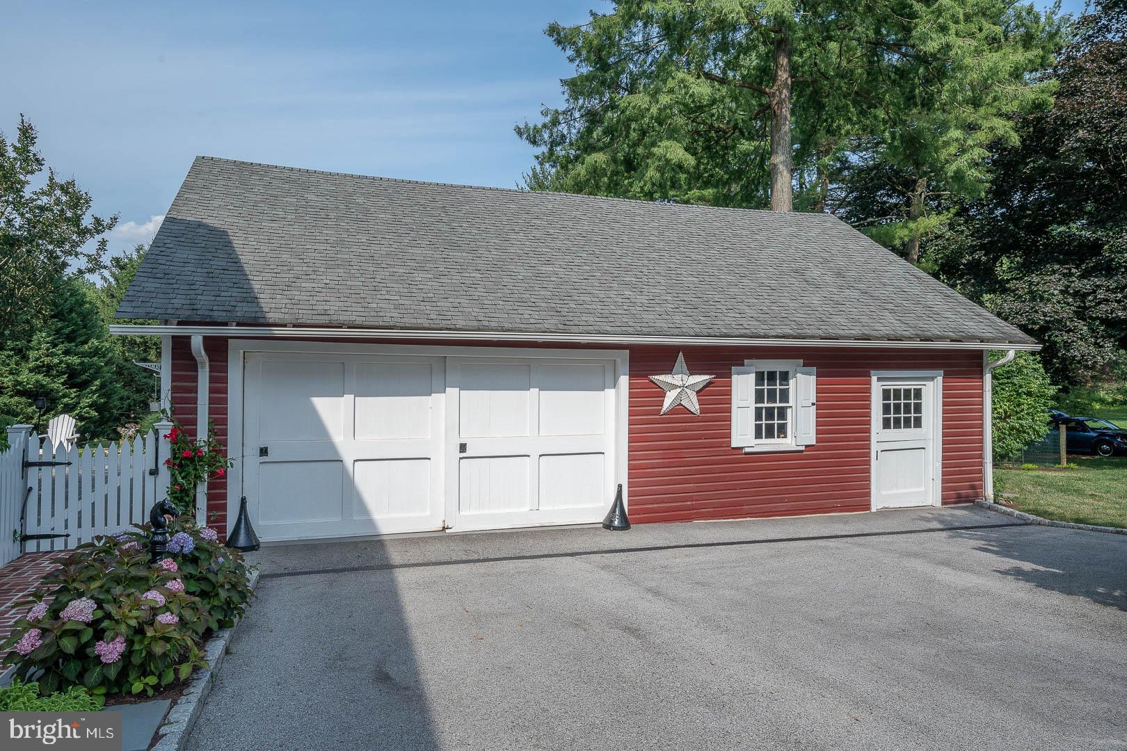 613 South Valley Forge Road Wayne, PA 19087 - Photo 36 of 43 a view of a house with a yard and garage