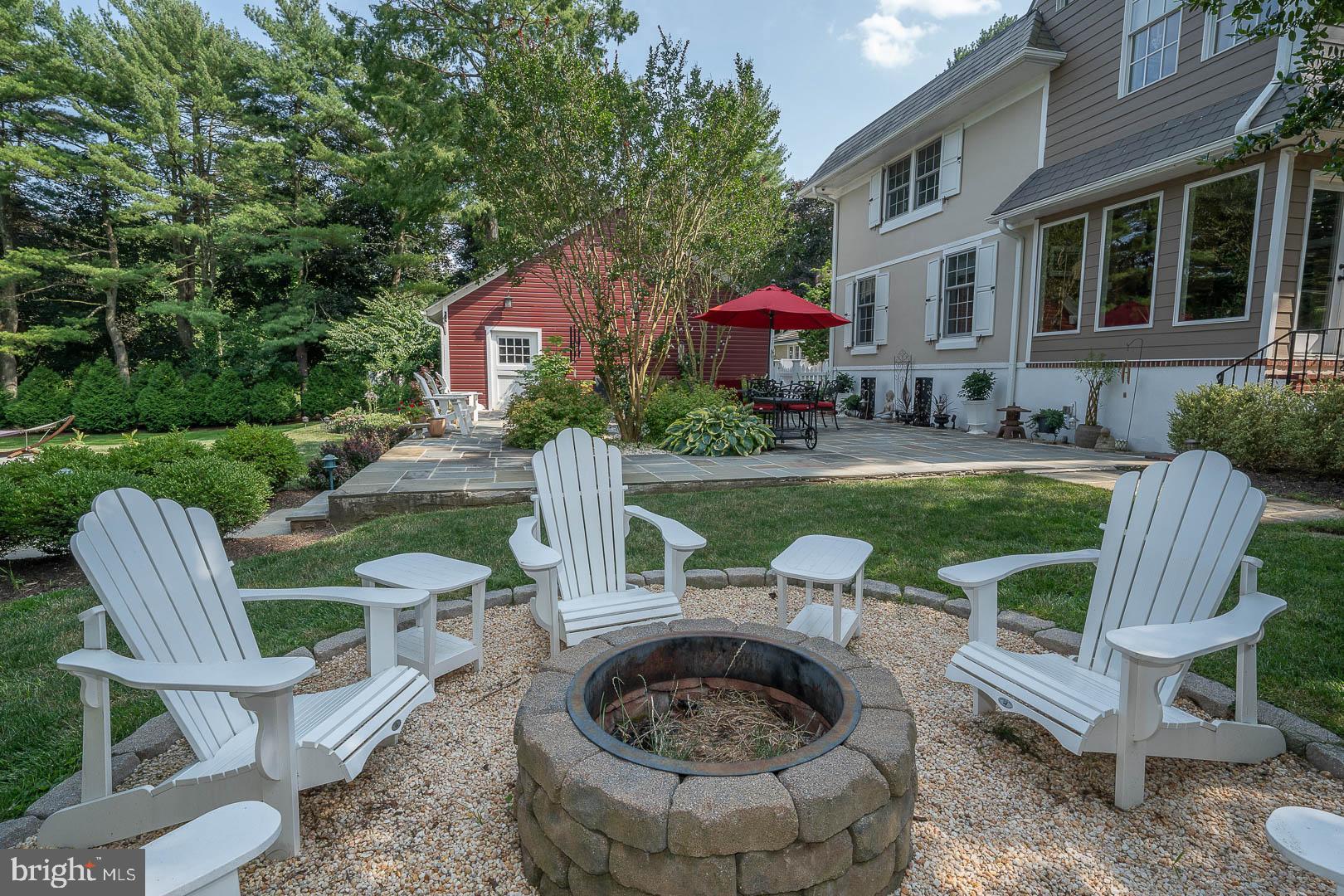 613 South Valley Forge Road Wayne, PA 19087 - Photo 40 of 43 a view of a chair and table in backyard of the house