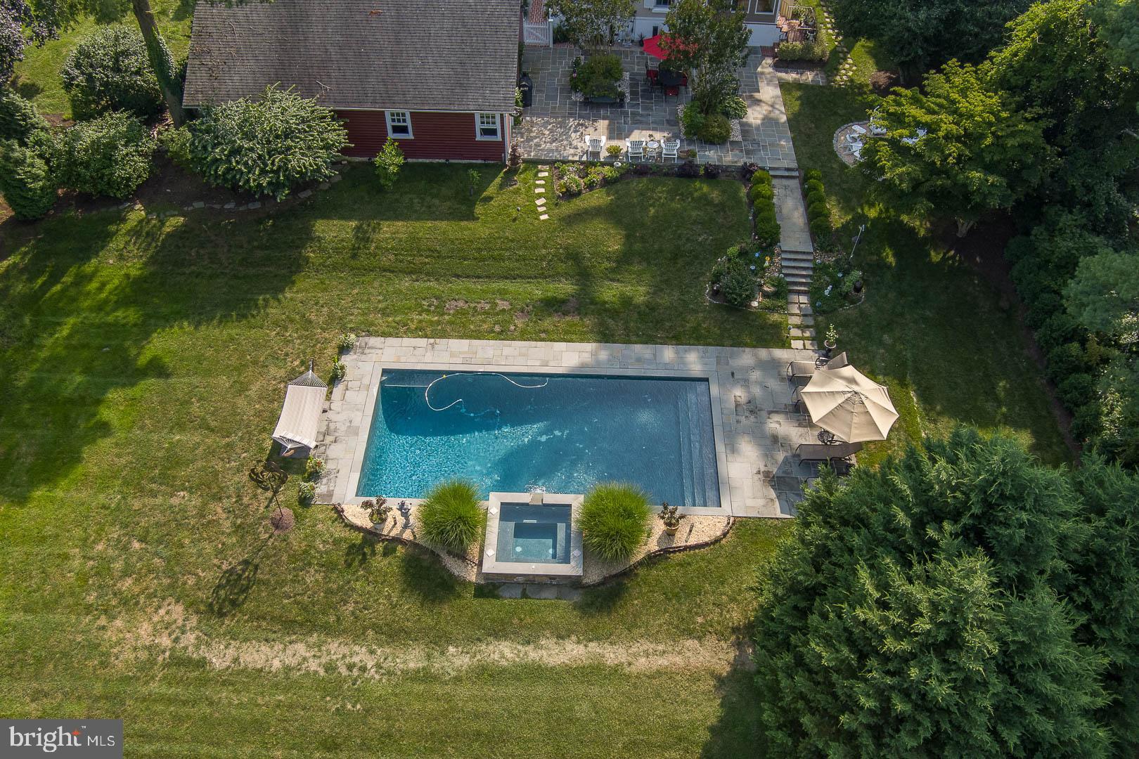 613 South Valley Forge Road Wayne, PA 19087 - Photo 42 of 43 an aerial view of a house with a yard basket ball court and outdoor seating