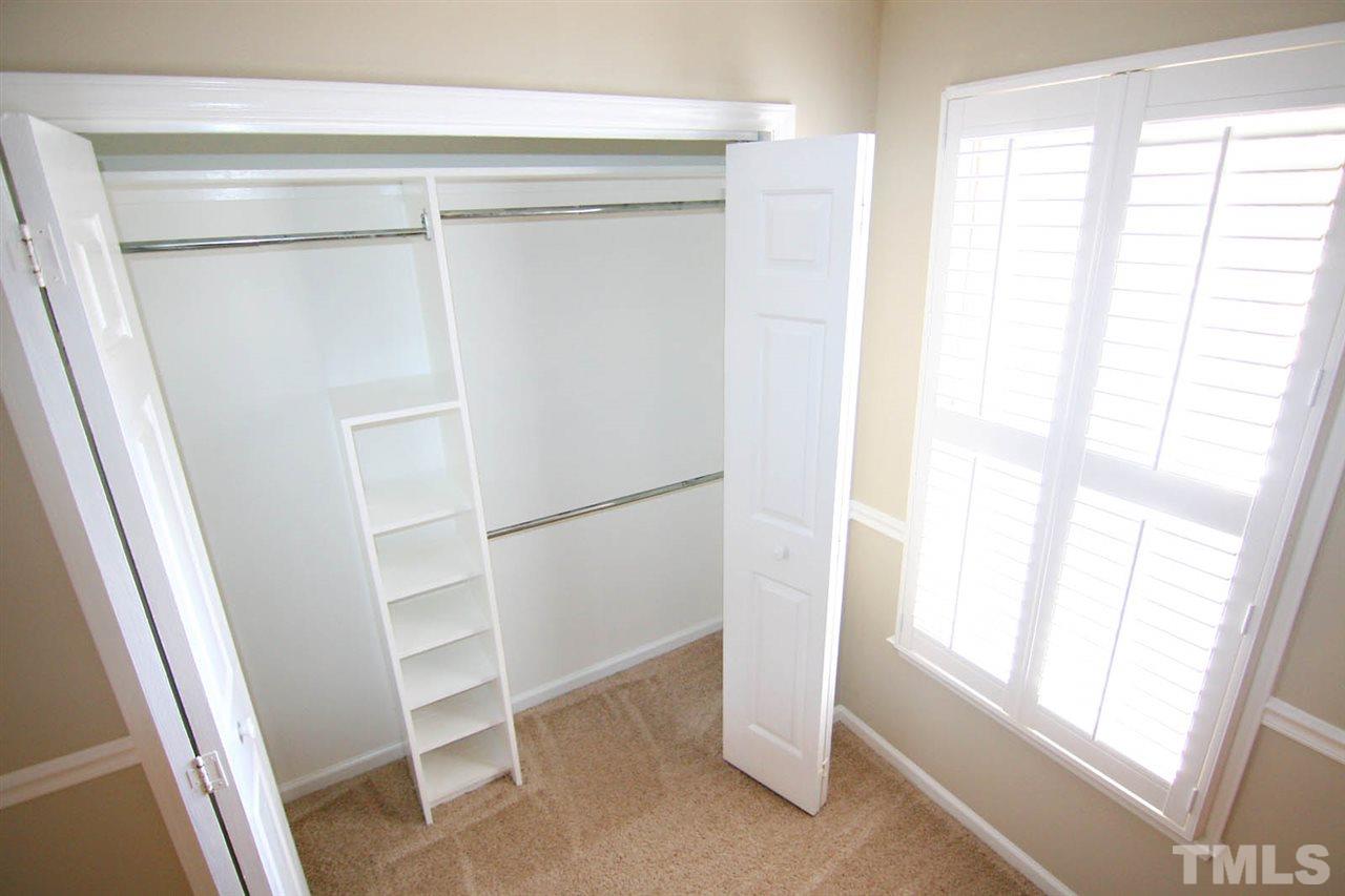 1581 Laureldale Drive Raleigh, NC 27609 - Photo 12 of 21 a view of walk in closet with empty racks