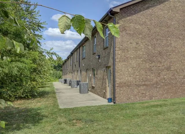 a view of a back yard of the house