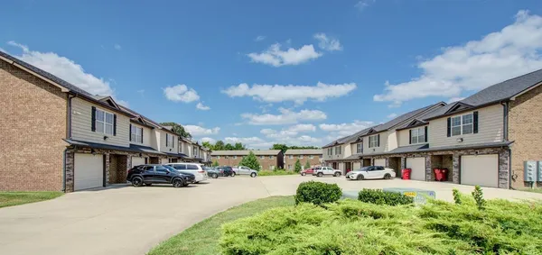 a view of street with parked cars