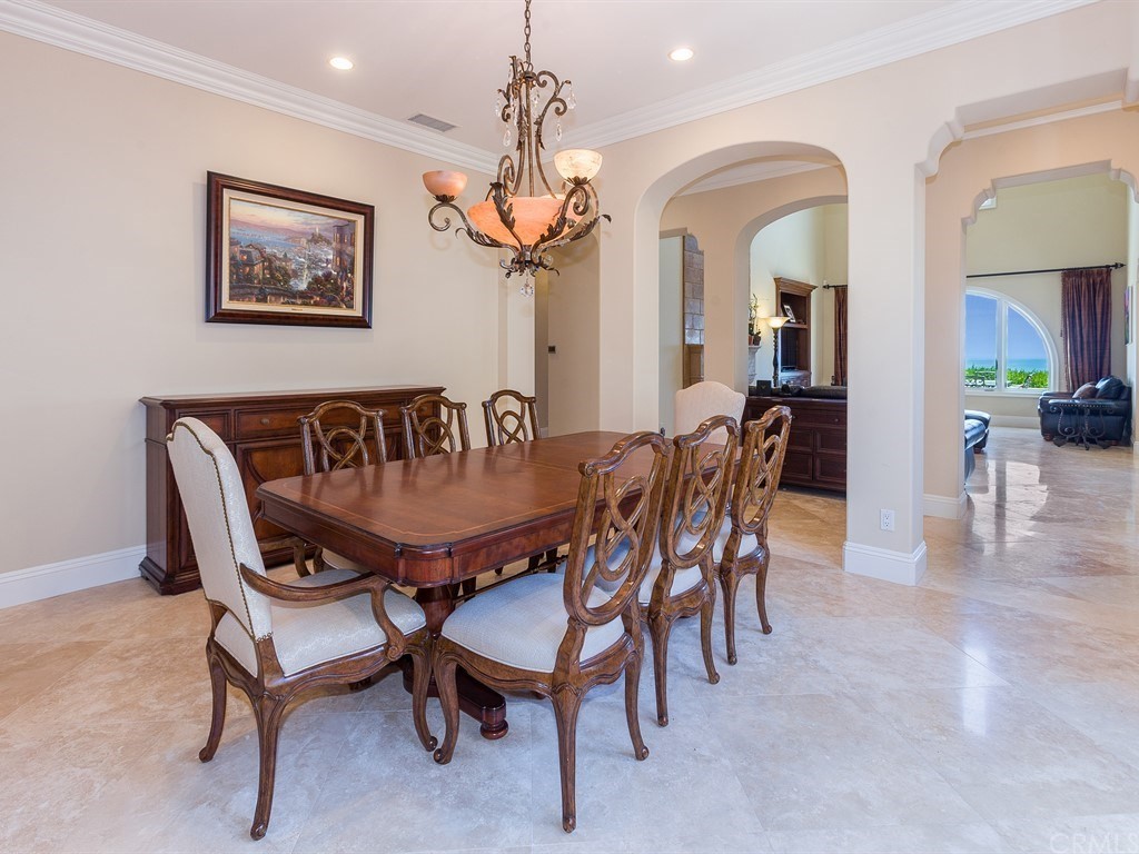 26 Tideline Bluff Newport Coast, CA 92657 - Photo 18 of 31 a view of a dining room with furniture