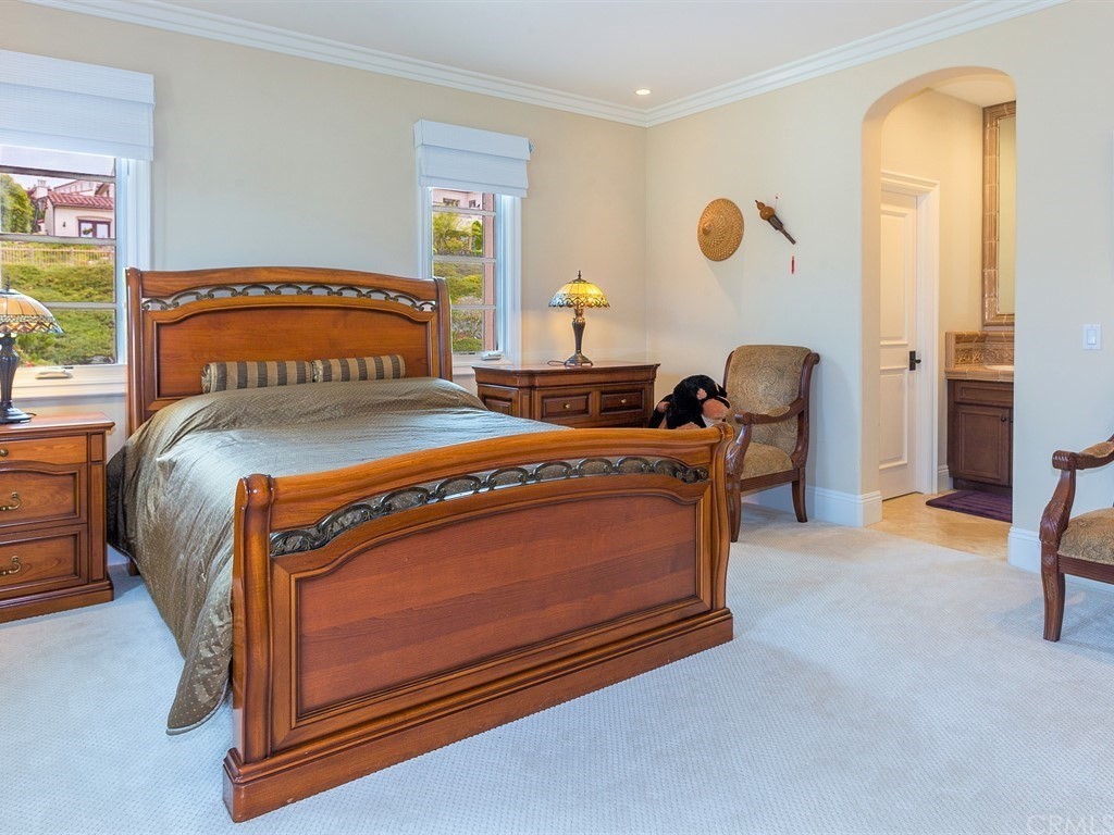 26 Tideline Bluff Newport Coast, CA 92657 - Photo 25 of 31 a bedroom with a bed and lamp