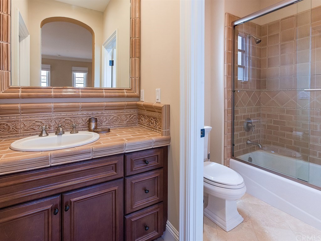 26 Tideline Bluff Newport Coast, CA 92657 - Photo 26 of 31 a bathroom with a sink and a mirror