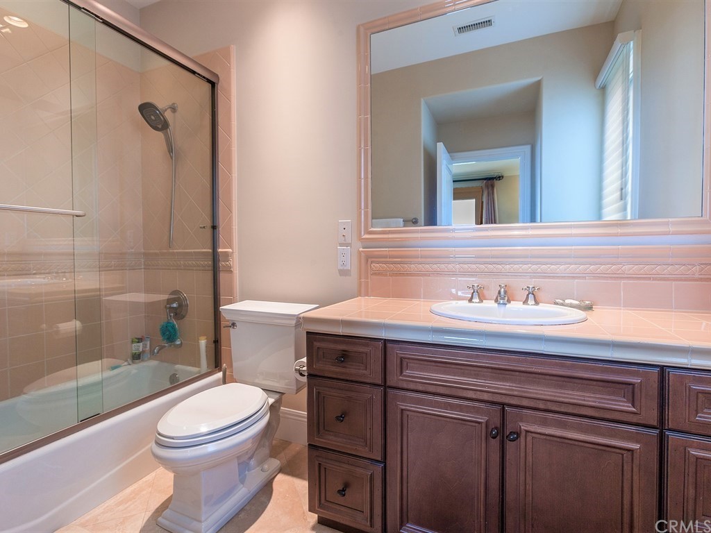 26 Tideline Bluff Newport Coast, CA 92657 - Photo 30 of 31 a bathroom with a sink a toilet and shower