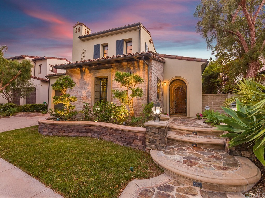 26 Tideline Bluff Newport Coast, CA 92657 - Photo 4 of 31 a front view of a house with garden