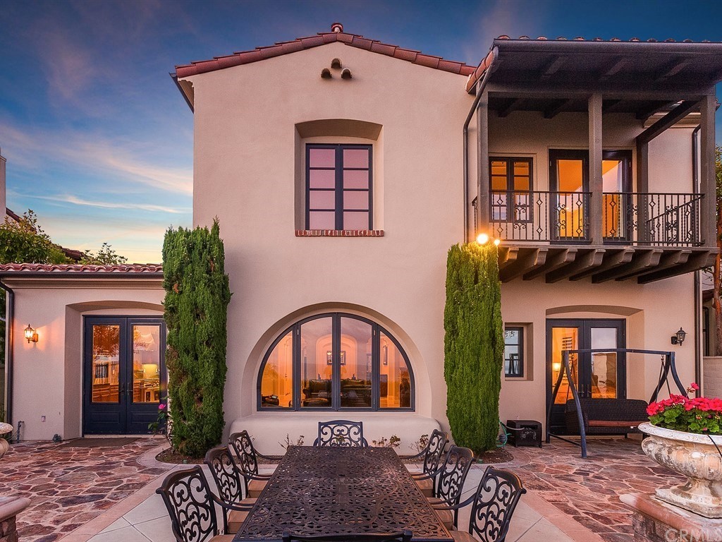 26 Tideline Bluff Newport Coast, CA 92657 - Photo 6 of 31 a front view of a house with large windows
