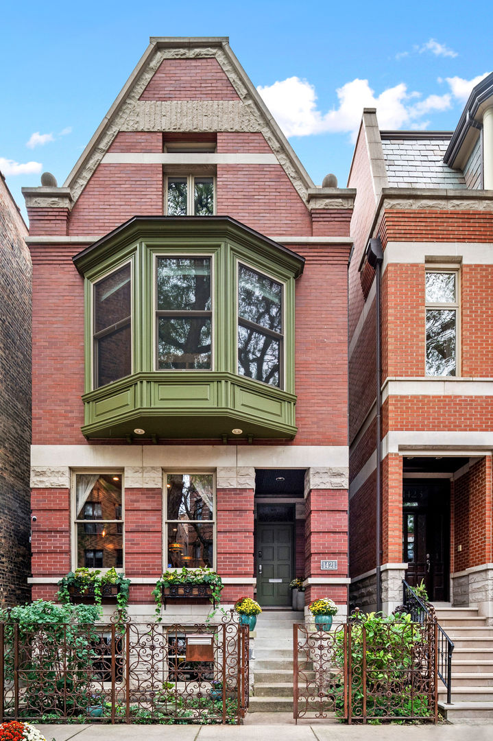 a front view of a multi story residential apartment building