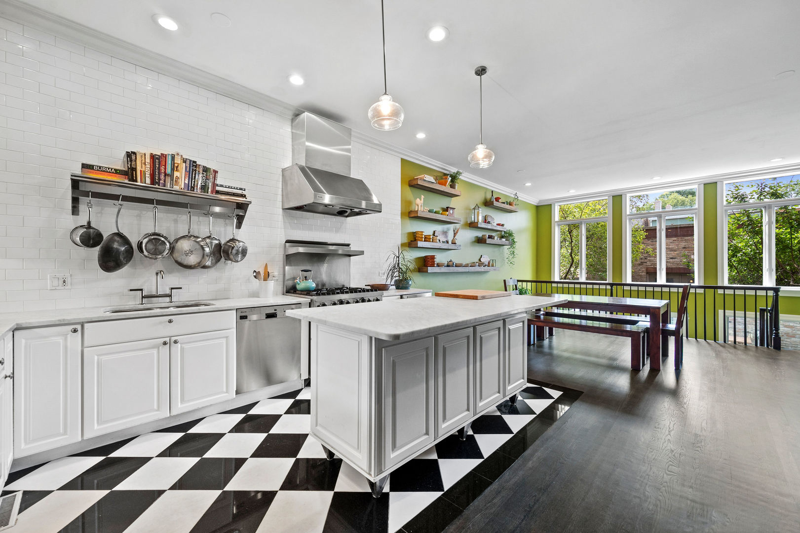 1421 West Lexington Street Chicago, IL 60607 - Photo 11 of 48 a kitchen with stainless steel appliances granite countertop a stove a sink and a refrigerator