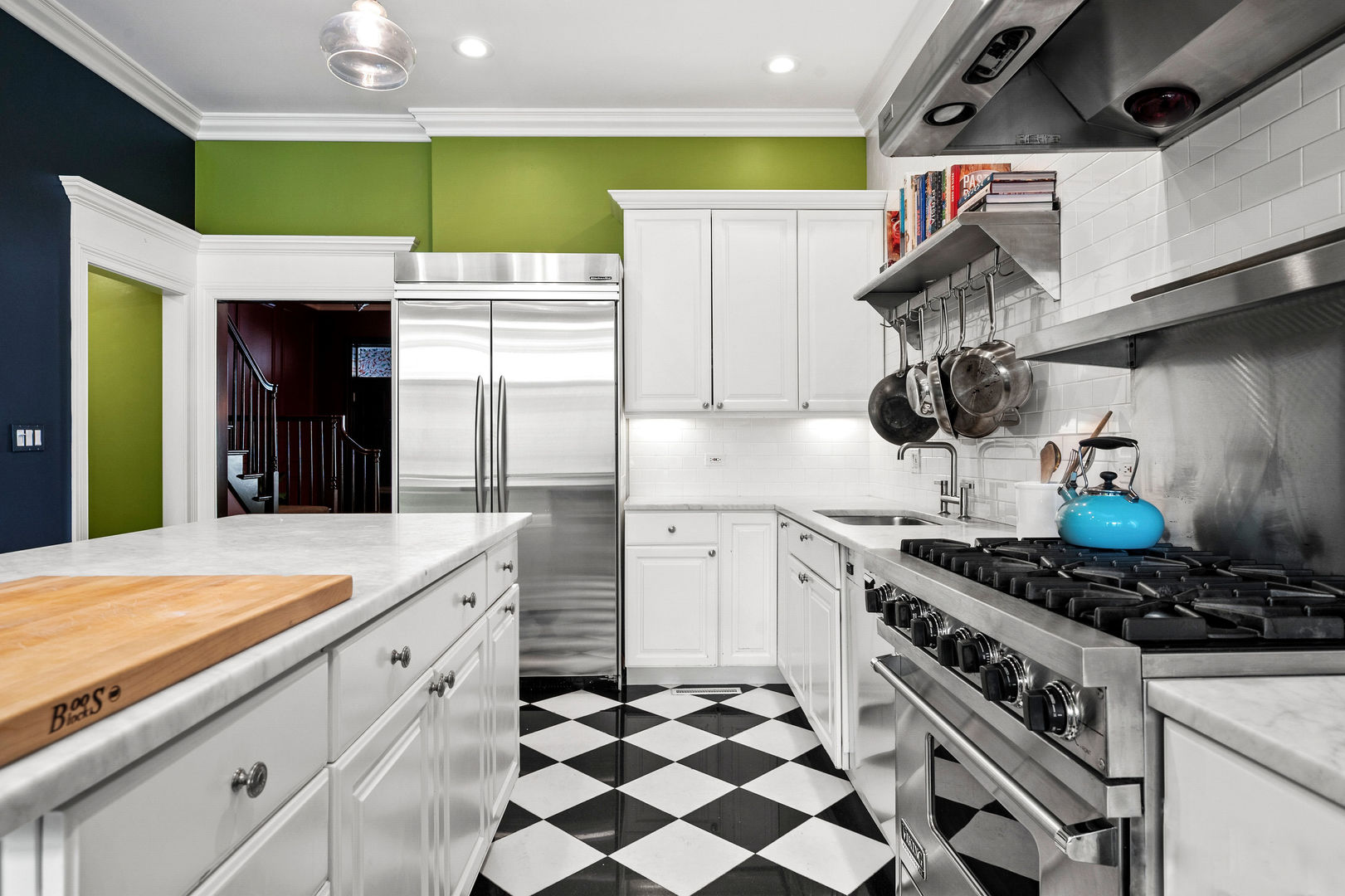 1421 West Lexington Street Chicago, IL 60607 - Photo 13 of 48 a kitchen with a sink a stove and refrigerator