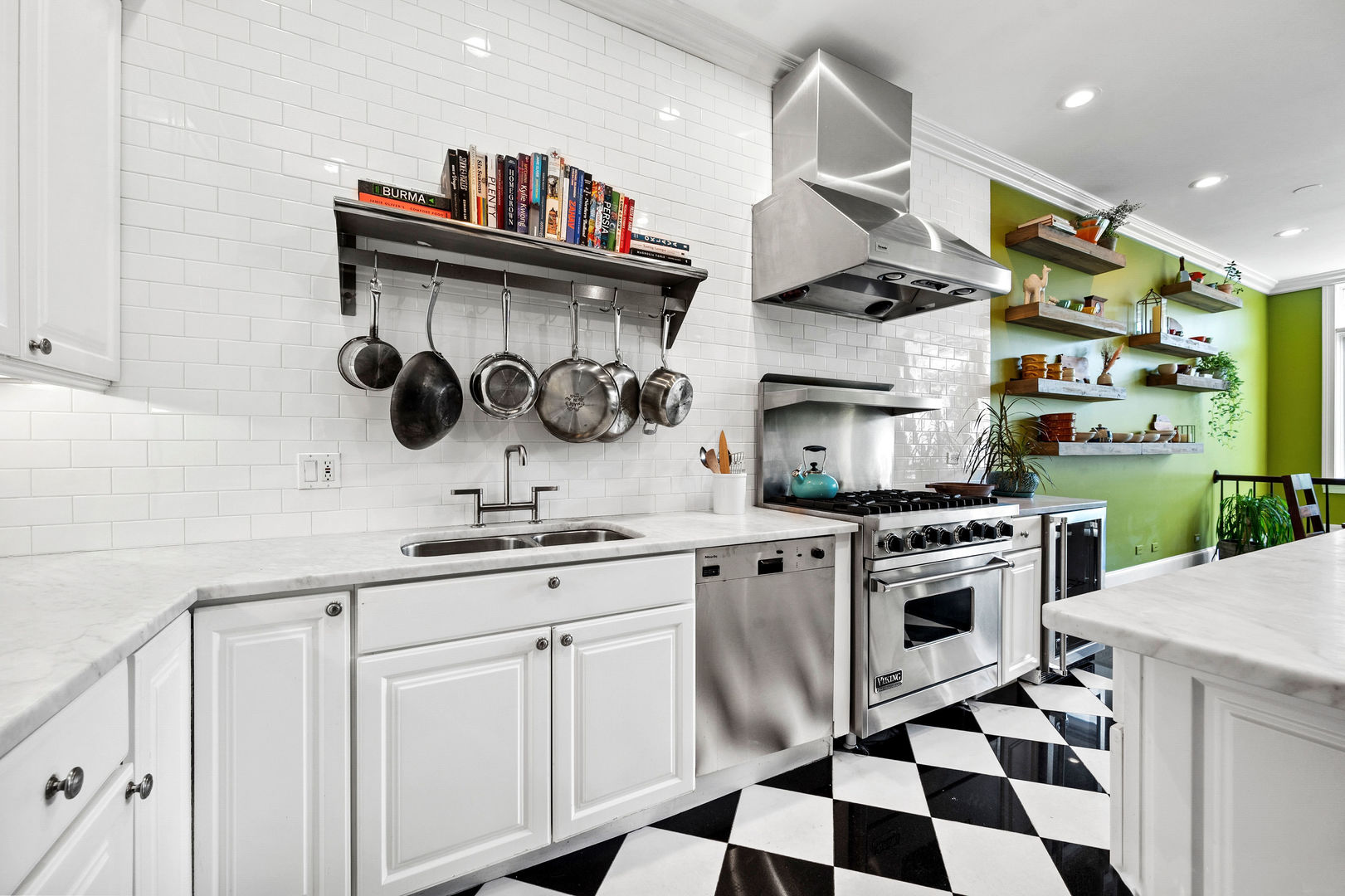 1421 West Lexington Street Chicago, IL 60607 - Photo 14 of 48 a kitchen with stainless steel appliances granite countertop a sink and cabinets