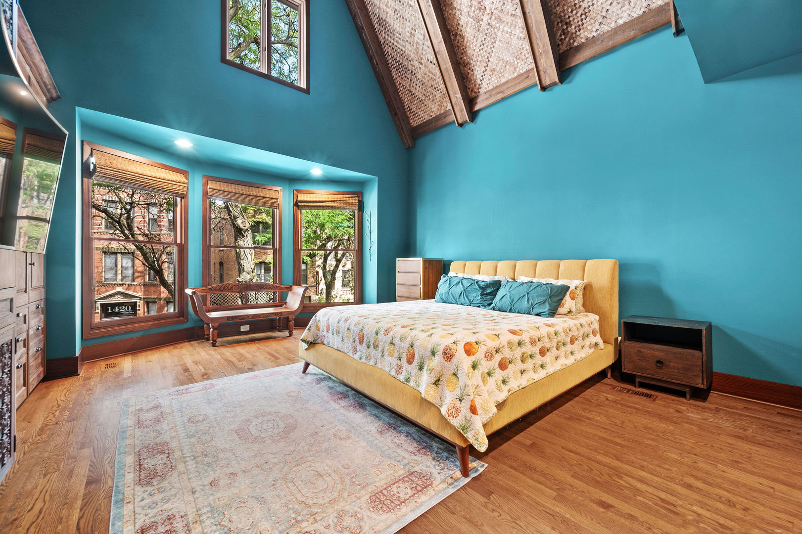 1421 West Lexington Street Chicago, IL 60607 - Photo 18 of 48 a bed sitting in a bedroom next to a window