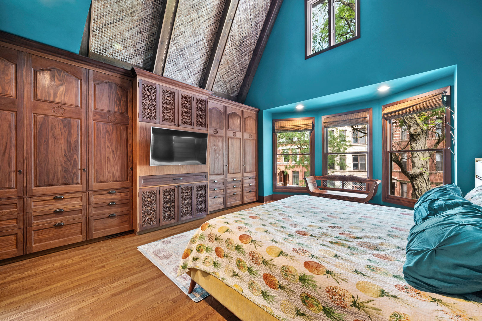 1421 West Lexington Street Chicago, IL 60607 - Photo 19 of 48 a bedroom with a bed window and a flat screen tv