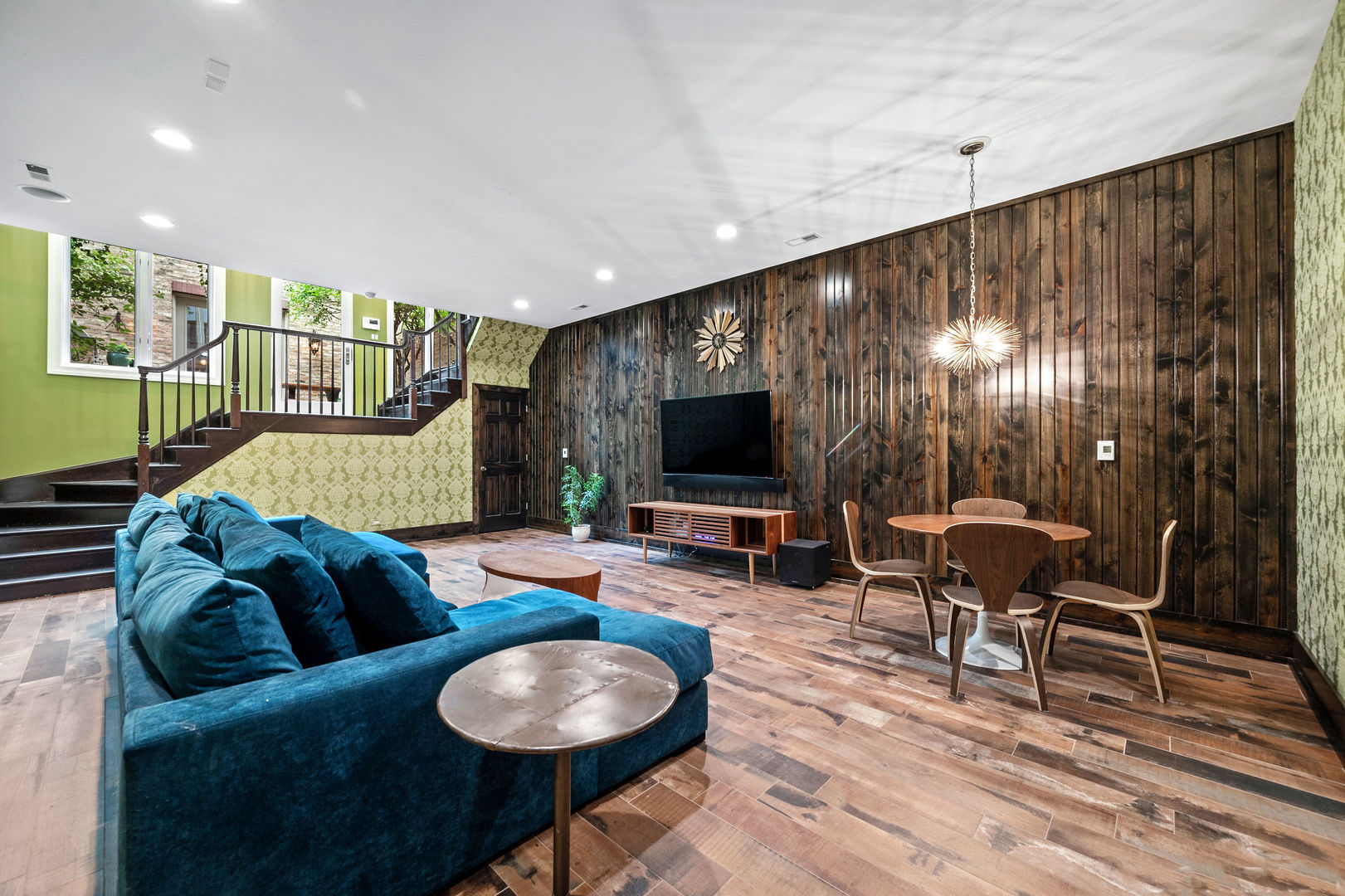 1421 West Lexington Street Chicago, IL 60607 - Photo 34 of 48 a living room with furniture and a flat screen tv