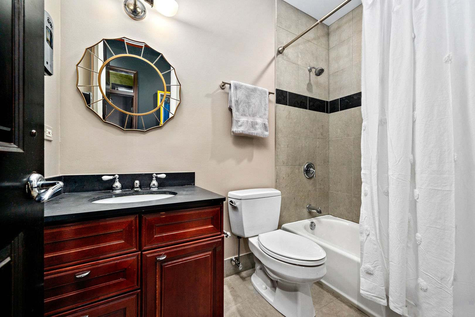 1421 West Lexington Street Chicago, IL 60607 - Photo 40 of 48 a bathroom with a toilet a sink and vanity