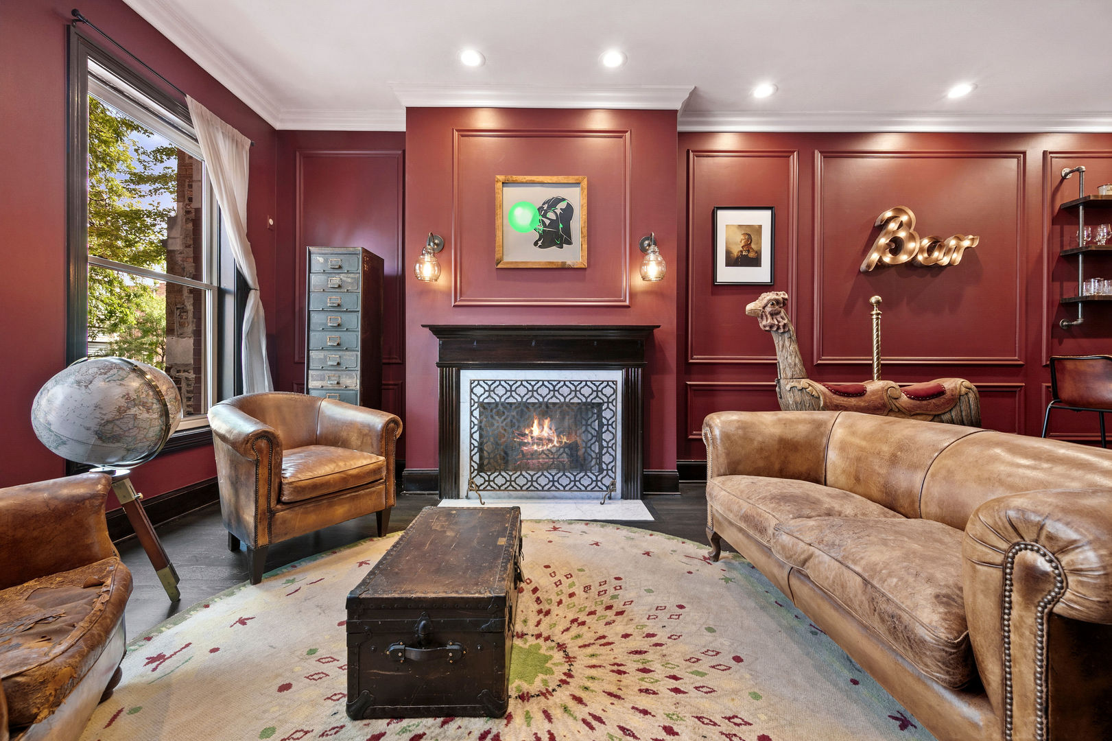 1421 West Lexington Street Chicago, IL 60607 - Photo 5 of 48 a living room with furniture and a fireplace