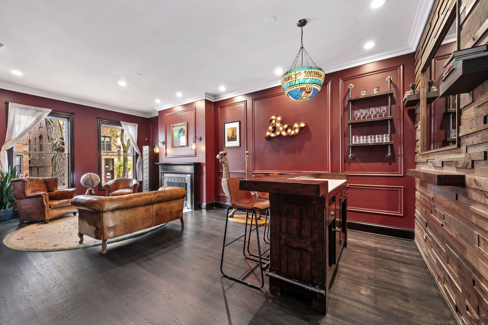 1421 West Lexington Street Chicago, IL 60607 - Photo 10 of 48 a living room with fireplace furniture and a chandelier
