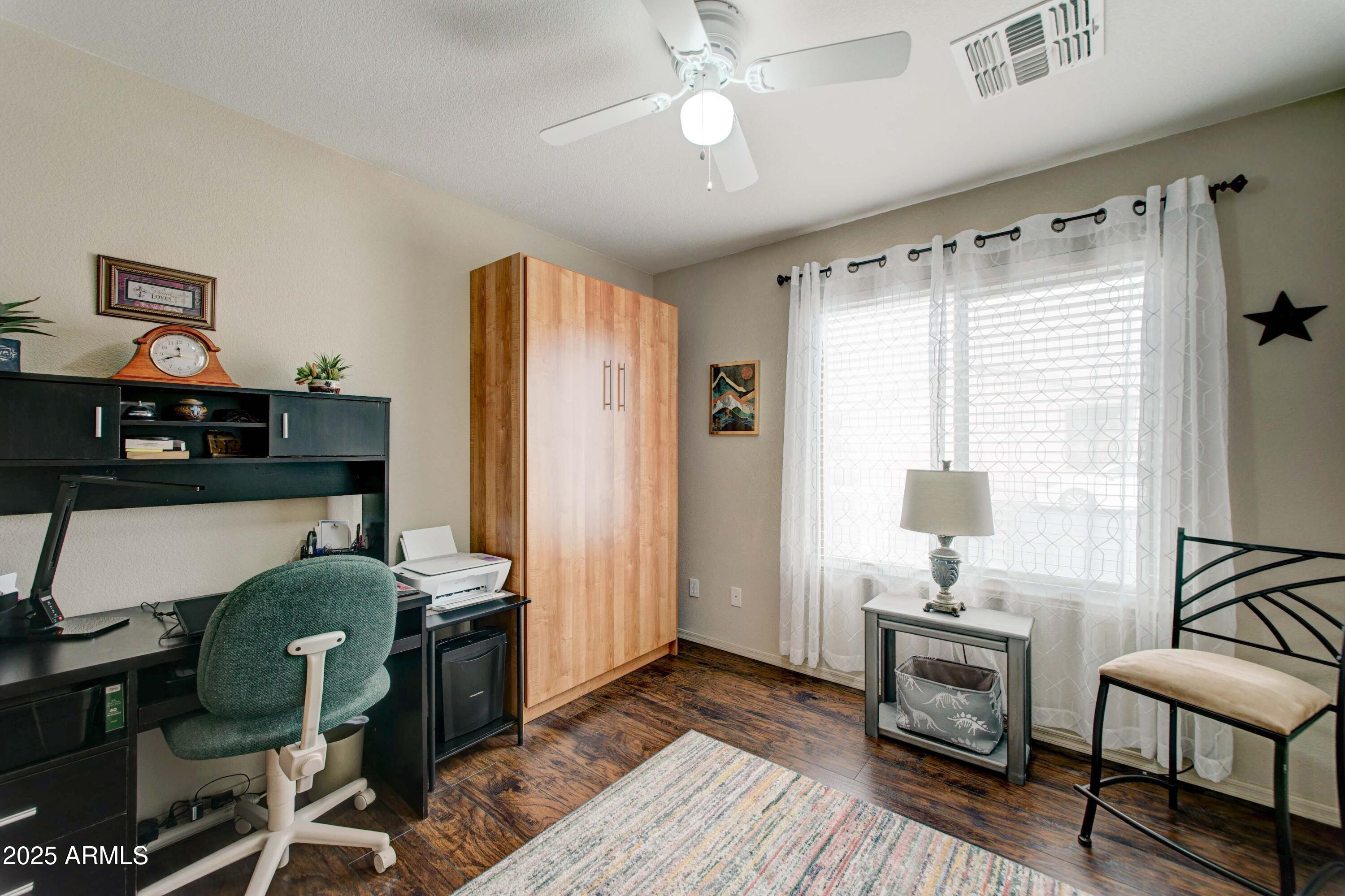 2101 South Meridian Road, Unit 432 Apache Junction, AZ 85120 - Photo 15 of 52 a workspace with furniture and window