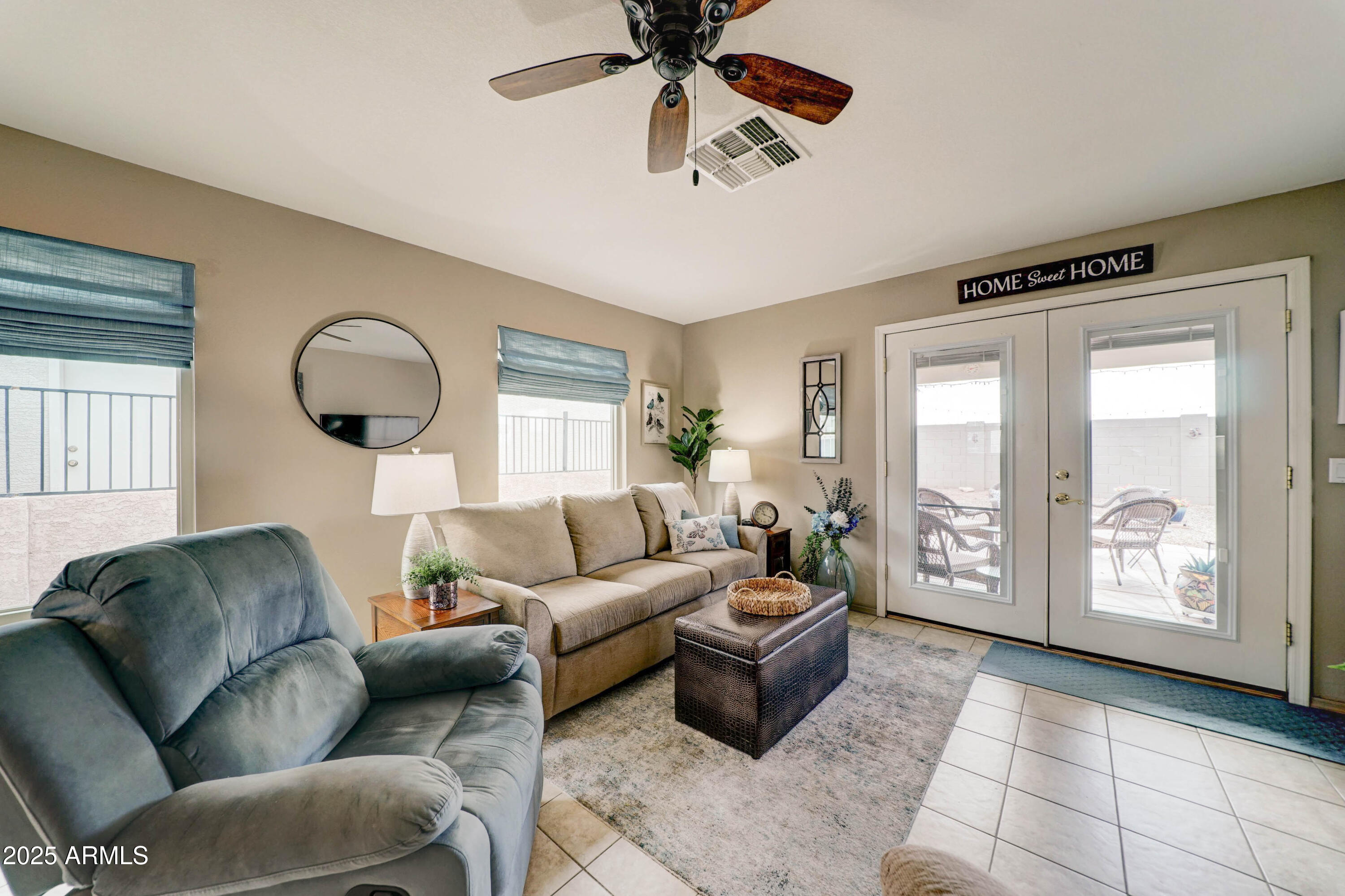 2101 South Meridian Road, Unit 432 Apache Junction, AZ 85120 - Photo 10 of 52 a living room with furniture and a large window
