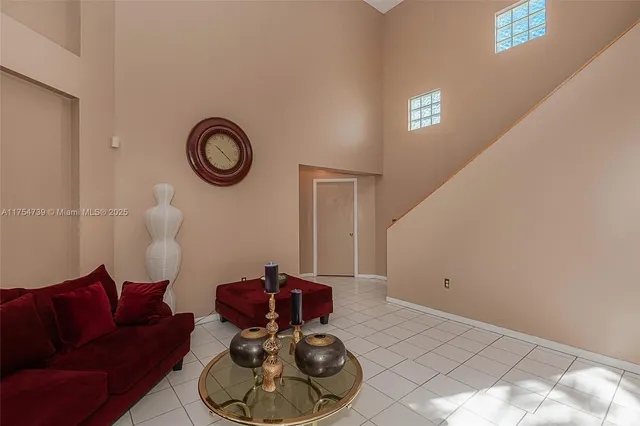 a room with furniture and a wooden floor