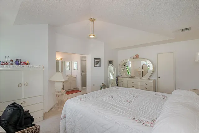 a bathroom with a sink a vanity and a mirror