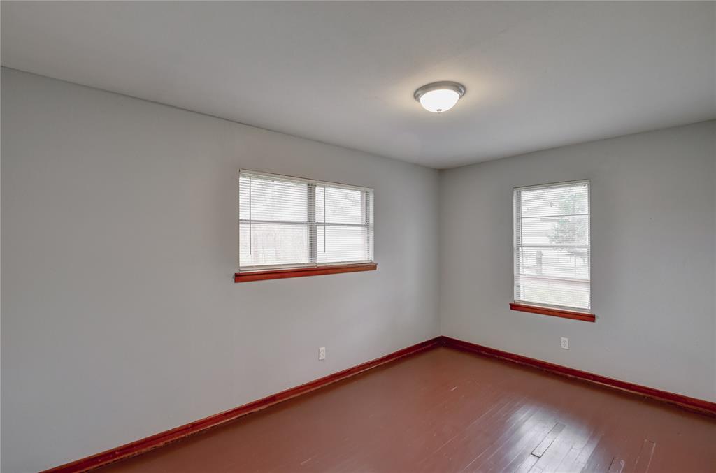 1002 North Stewart Street Azle, TX 76020 - Photo 12 of 29 an empty room with windows