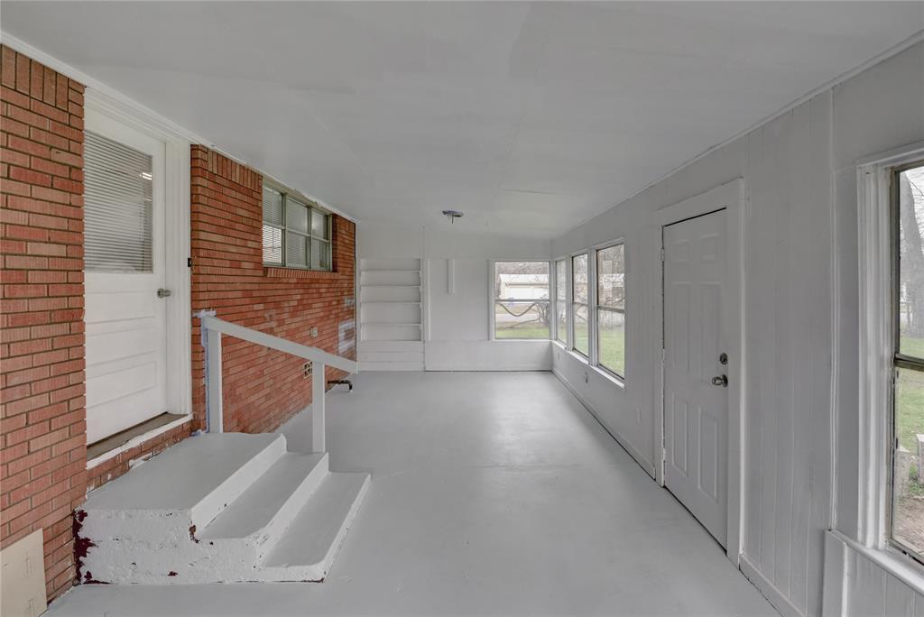 1002 North Stewart Street Azle, TX 76020 - Photo 25 of 29 a view of entryway with wooden floor