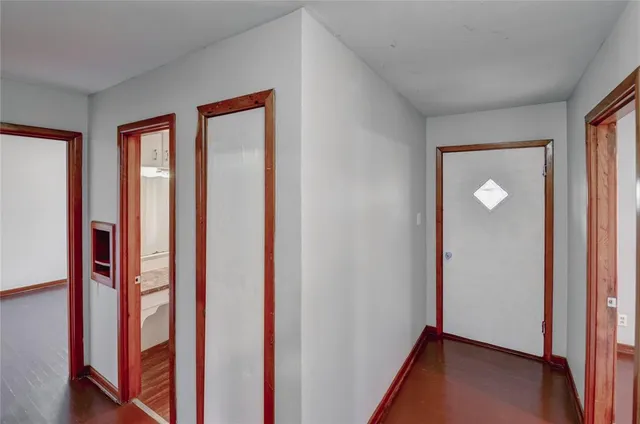 a bathroom with a sink a toilet and shower curtain
