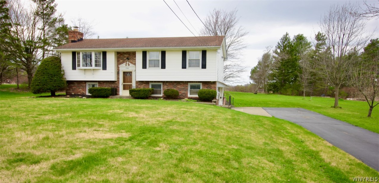 7980 Old Jennings Road Eden, NY 14057 - Photo 2 of 31 Front yard blacktop driveway